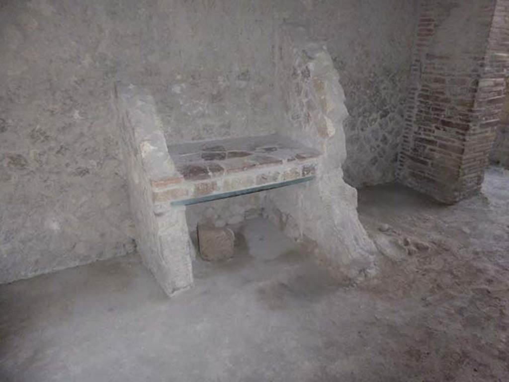 V 19, Herculaneum. October 2014. Hearth and latrine against the east wall. Photo courtesy of Michael Binns.